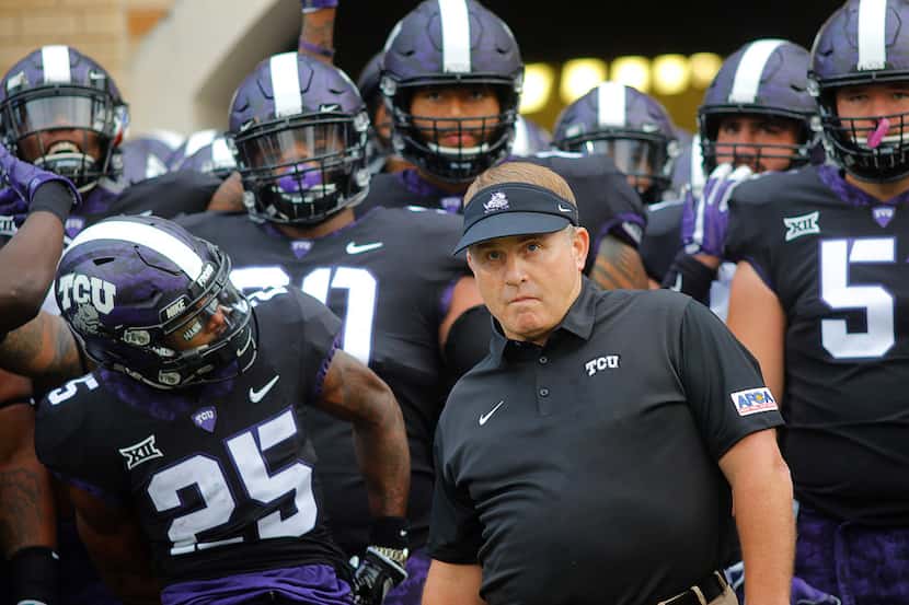 Texas Christian head coach Gary Patterson and his team get ready to take the field against...