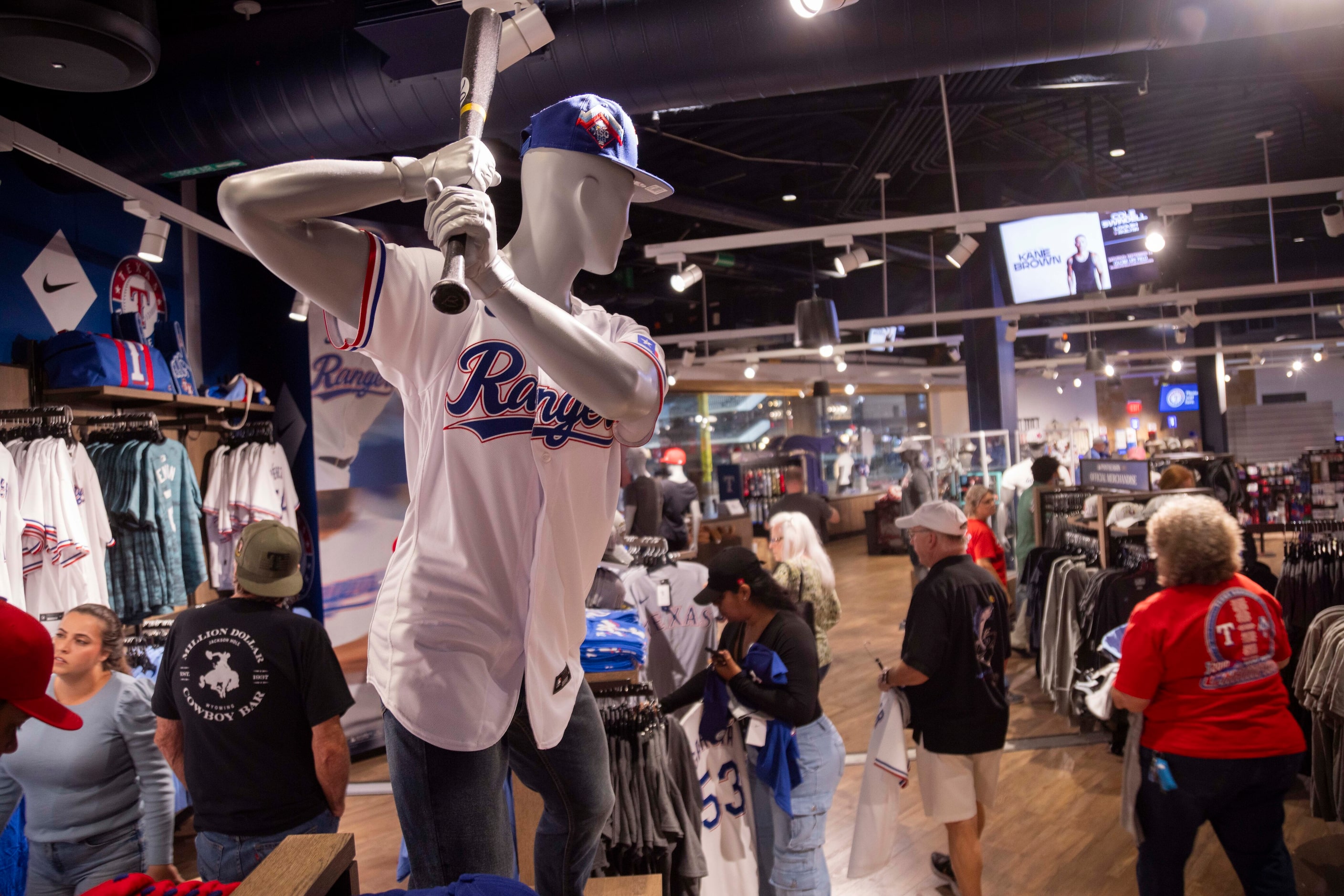 Fans shop at the Grand Slam Team Store in Arlington on Tuesday, Oct. 24, 2023. Texas Rangers...