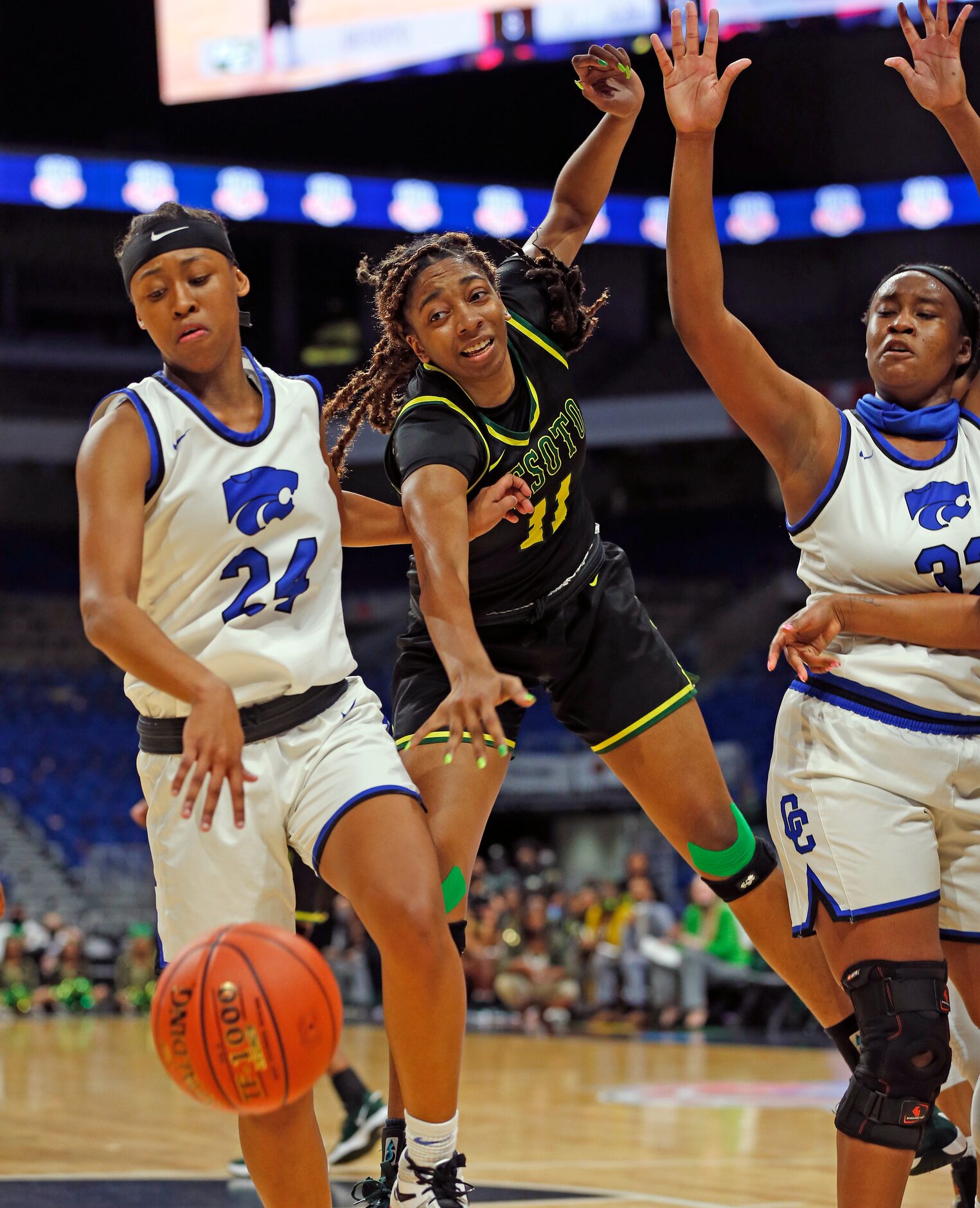 DeSoto Tionna Herron #11 battles Cypress Creek Krishawn Lee #24 for a rebound. DeSoto vs....