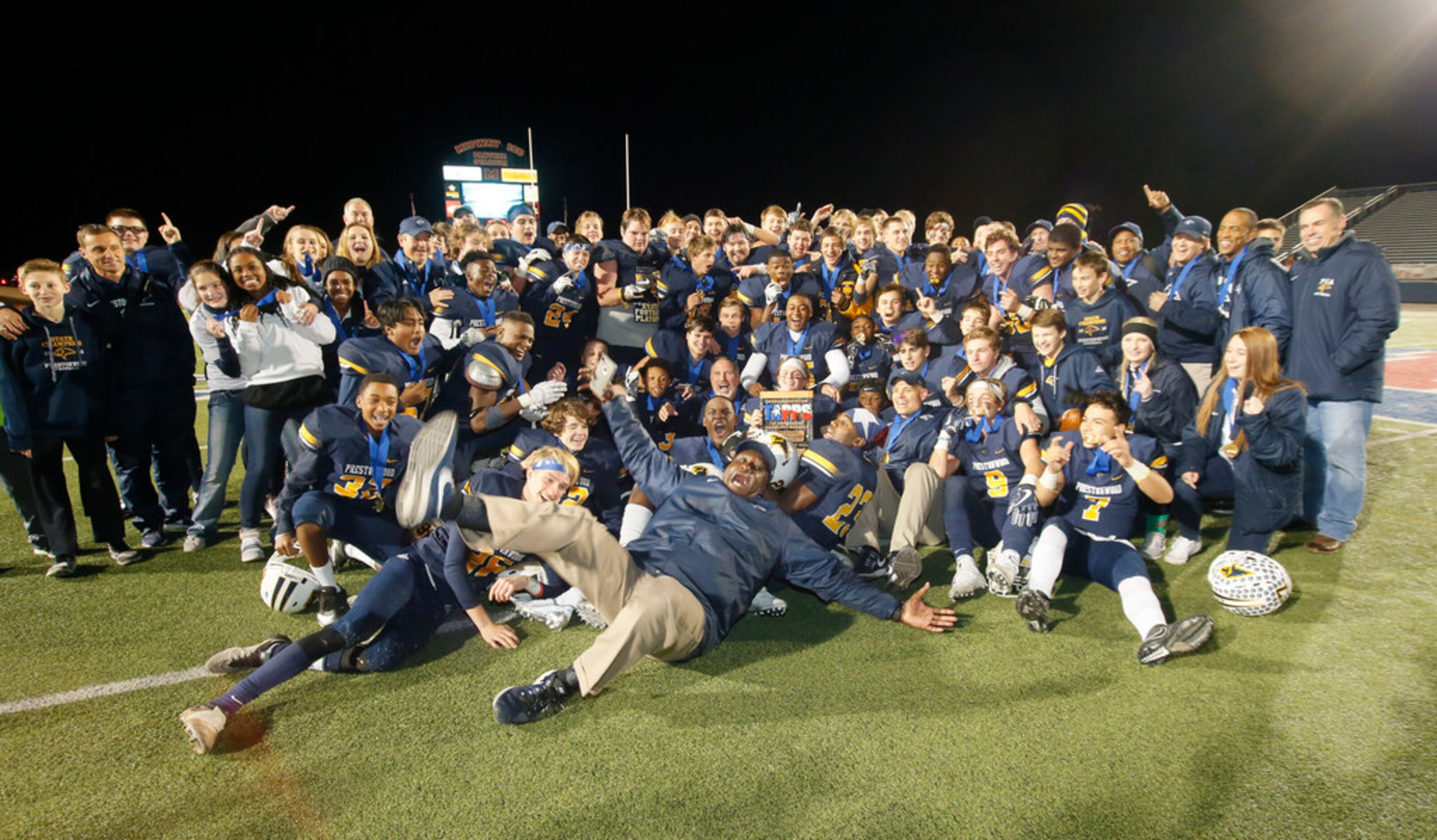 Prestonwood Christian Academy football celebrates after winning the TAPPS Division 1 11-man...