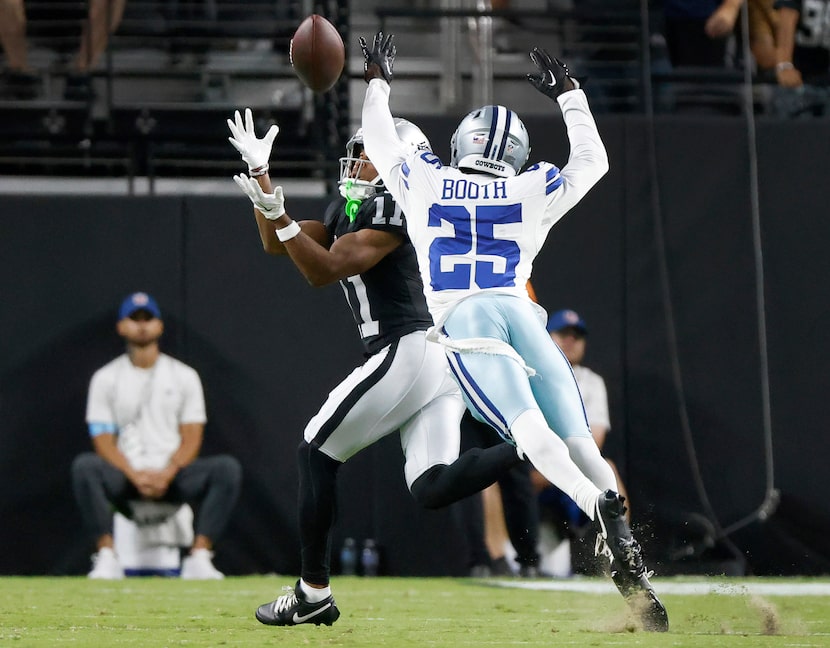 Las Vegas Raiders wide receiver Tre Tucker (11) pulls down a long pass reception ahead of...