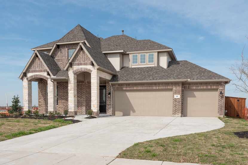 The Duchman design from Pacesetter Homes is located at 810 Grove Vale Drive in Prosper’s...