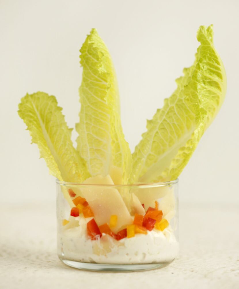 CAESAR DIP BY THE GLASS: Pour enough Caesar salad dressing in the glass to come up the sides...