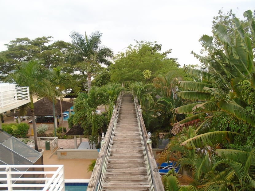 A long boardwalk leads from the grounds of Hedonism II to a beautiful Caribbean beach on the...