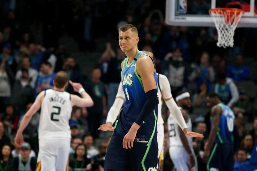 Dallas Mavericks forward Kristaps Porzingis (6) reacts after shooting an airball against the...