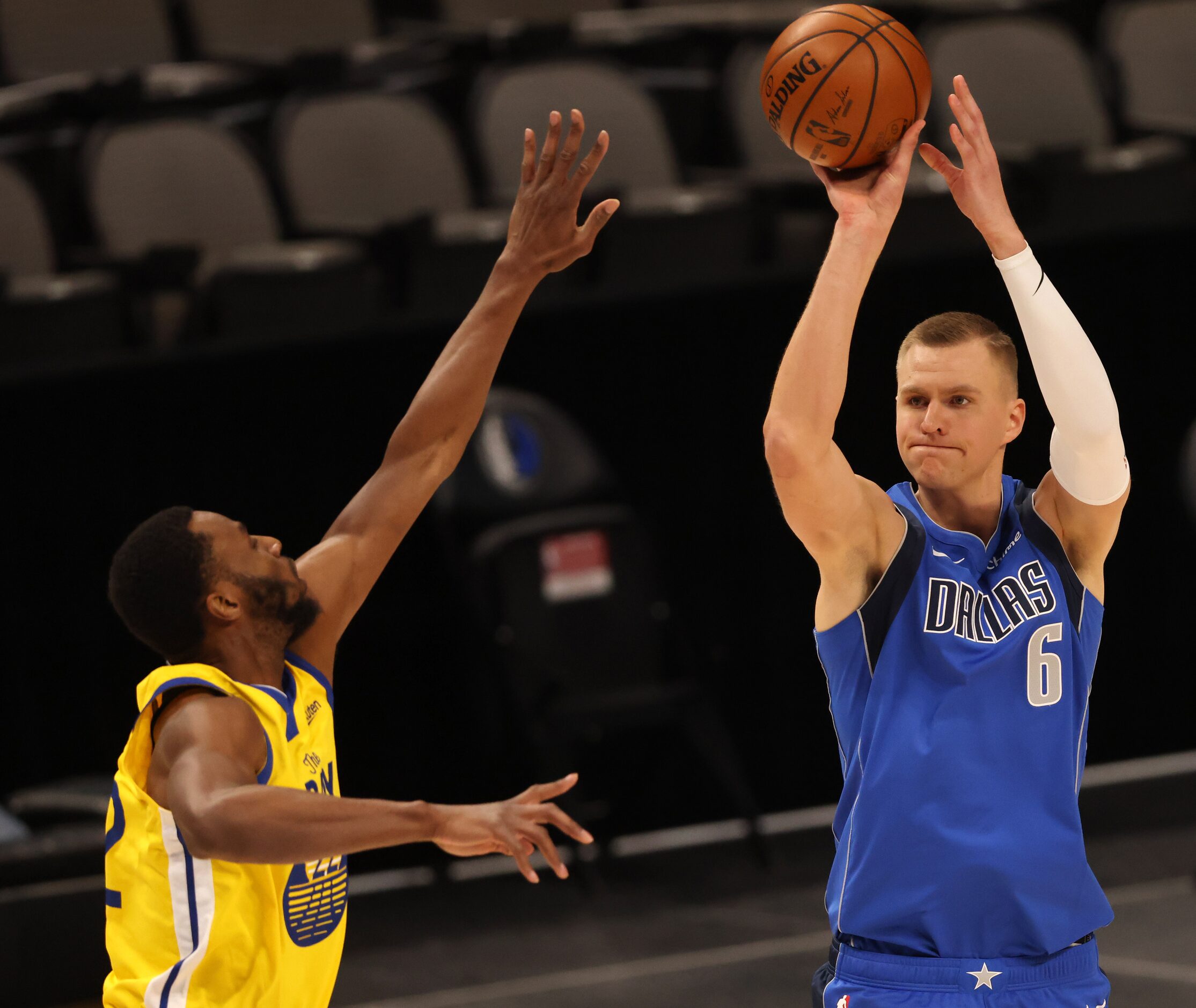 Dallas Mavericks forward Kristaps Porzingis (6) attempts a shot in front of Golden State...