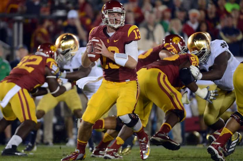 LOS ANGELES, CA - NOVEMBER 24:  Max Wittek #13 of the USC Trojans looks to pass during a...