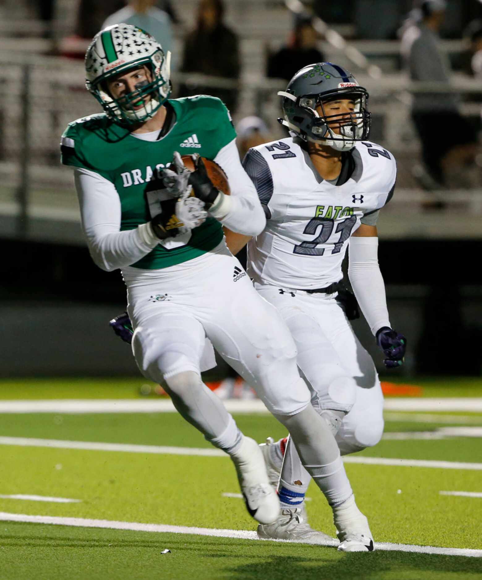 Southlake's Wills Meyer (5) scores a touchdown in front of Eaton's Jalen Thompson (21)...