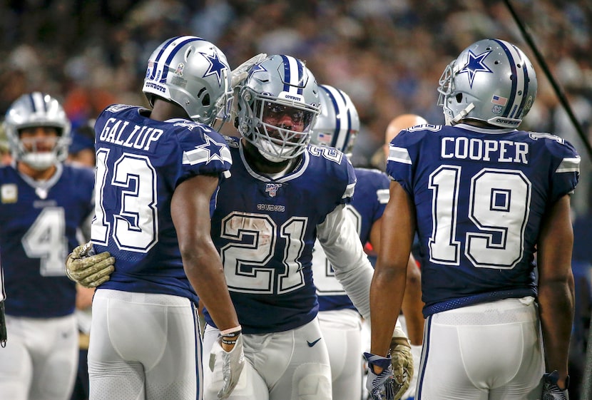 Dallas Cowboys wide receiver Michael Gallup (13) celebrates scoring a touchdown with running...