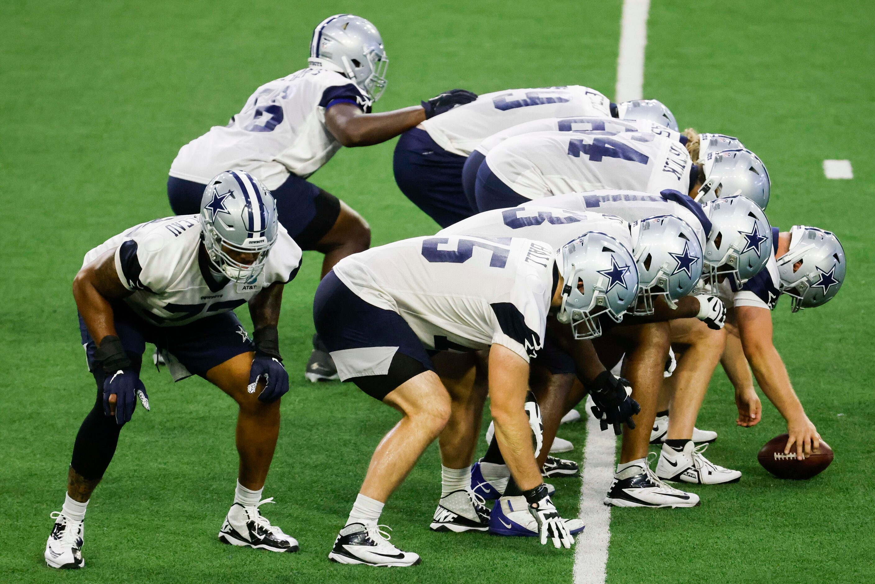 Dallas Cowboys players take part in a drill during a mini camp session at The Star in Frisco...