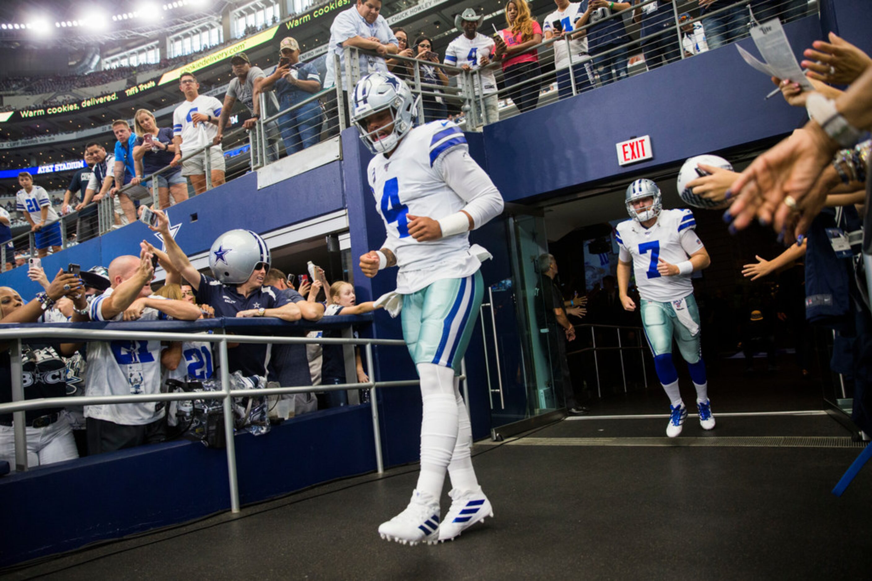 Dallas Cowboys quarterback Dak Prescott (4) enters the field for warm ups before an NFL game...