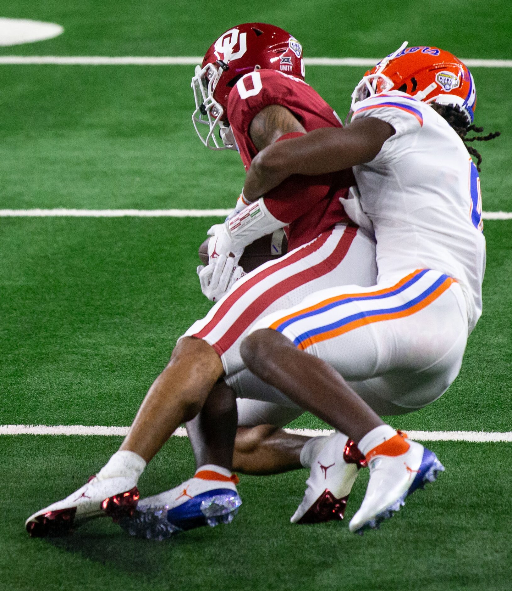 Oklahoma Sooners cornerback Woodi Washington (0) catches a touchdown pass intended for...