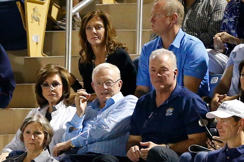 Dallas Cowboys owner Jerry Jones and his wife Gene are joined by their kids, from back left,...