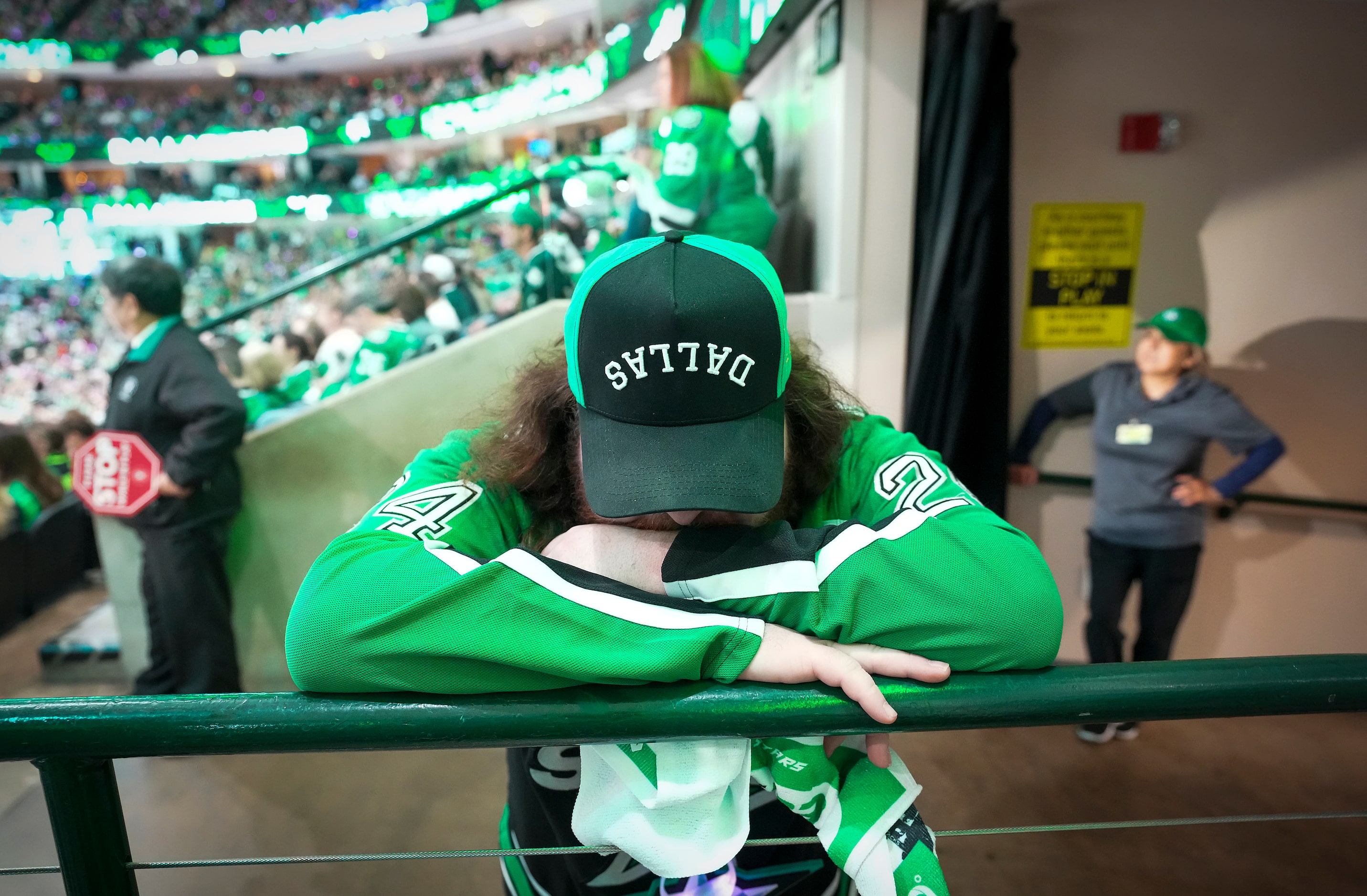 A Dallas Stars fan reacts after the third Vegas Golden Knights goal of the first period in...