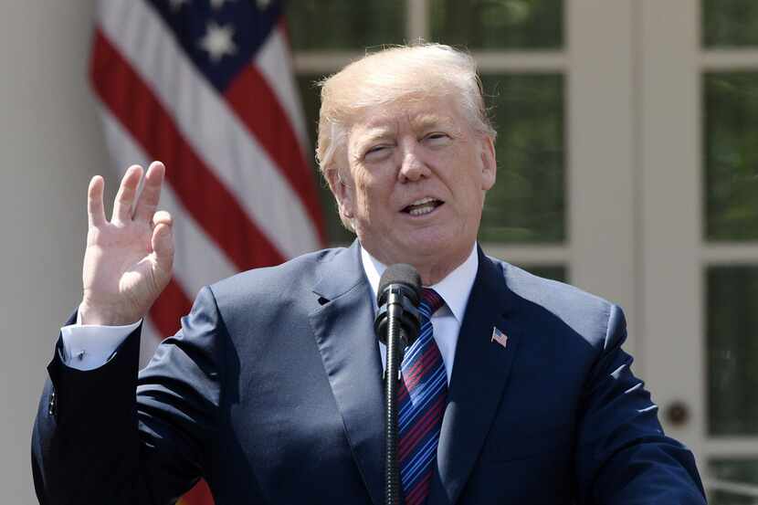 President Donald Trump speaks in the Rose Garden of the White House on April 12, 2018, in...