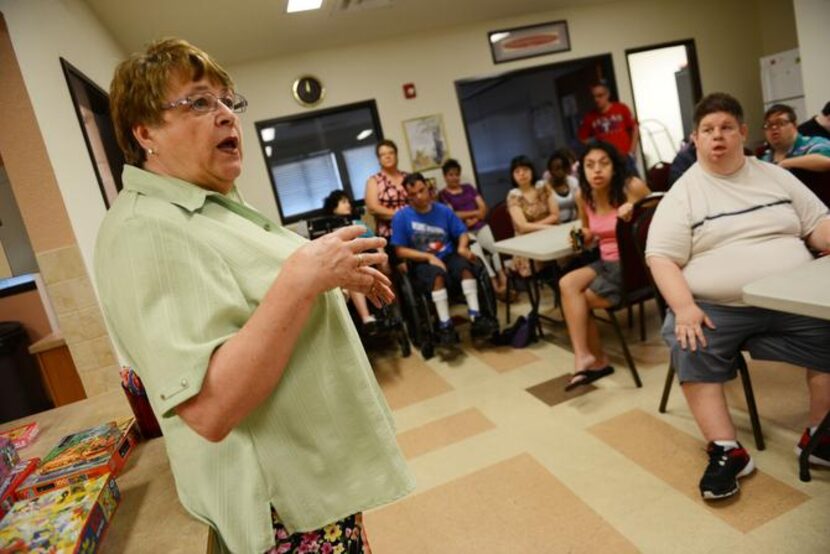 
Director Cheryl Yaeger talks to students at Academy of Learning for Life. The half-day...