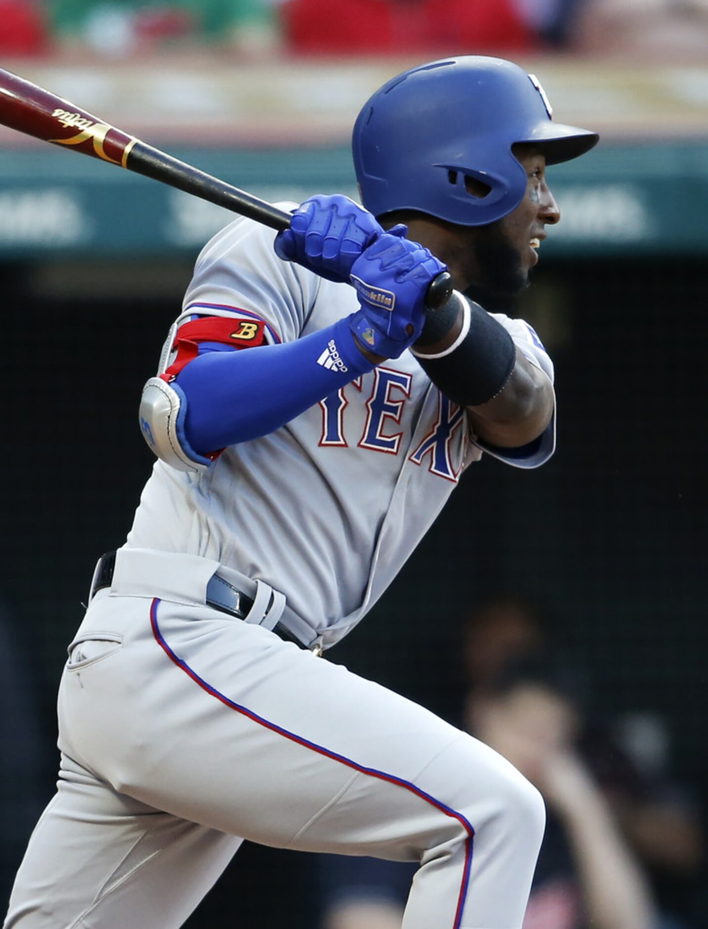 CLEVELAND, OH - MAY 01: Jurickson Profar #19 of the Texas Rangers hits a one run double off...