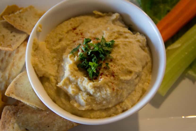 Mmmmm ... hummus! Keep portion control in mind when snacking, plus opt for vegetables as...