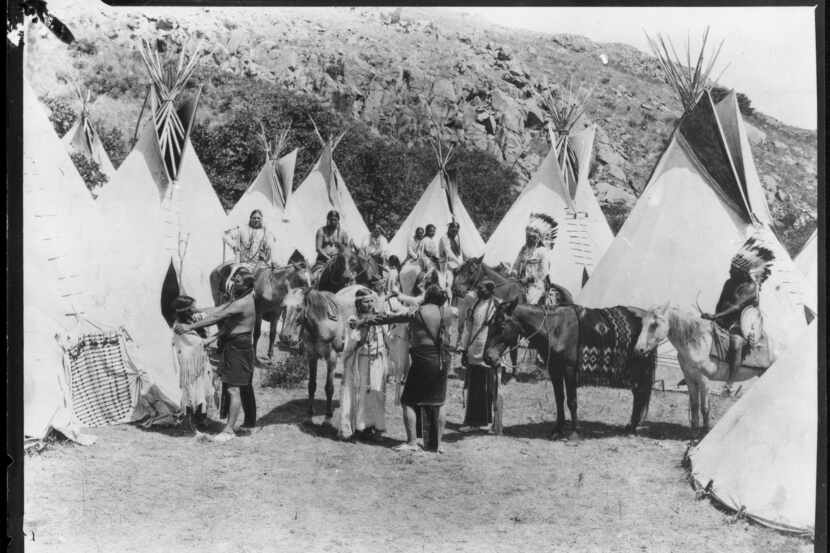 In this photo provided by the Oklahoma Historical Society, members of an all Comanche and...