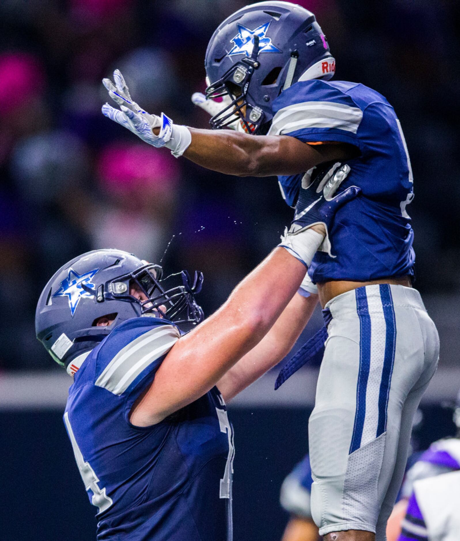 .Frisco Lone Star running back Jaden Nixon (5) and offensive lineman Nathan Deason (74)...