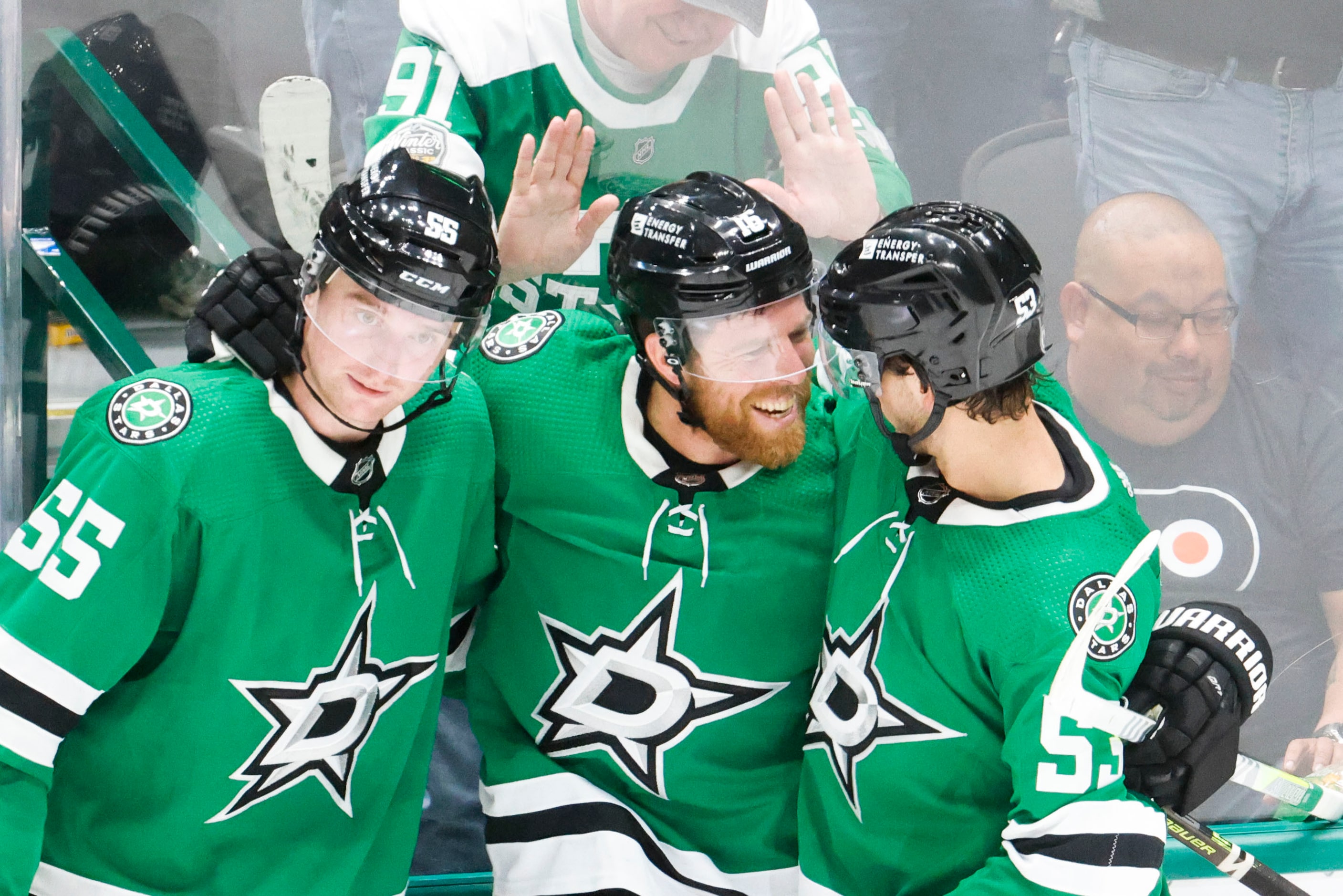 Dallas Stars center Joe Pavelski (center) celebrates his overtime goal with defenseman...