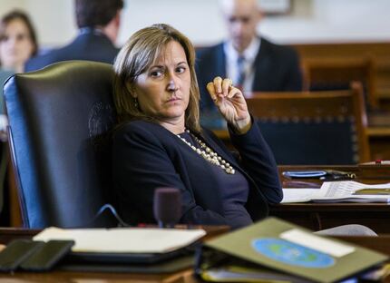 Sen. Konni Burton, R-Colleyville, listens to discussions on open carry legislation during...