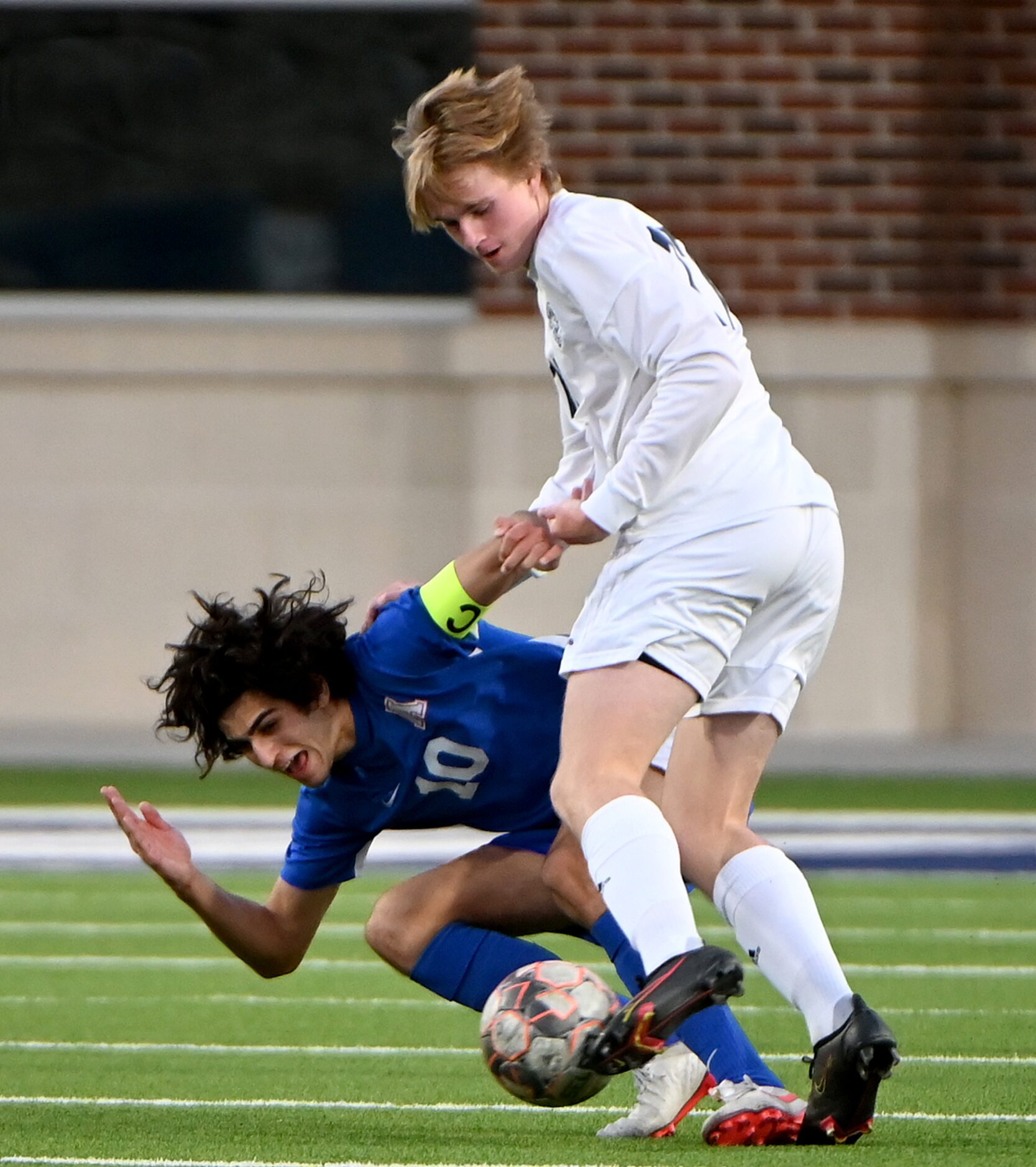 Allen’s Sam Presser (10) draws a foul from Flower Mound’s Justin Krupa in the second half of...