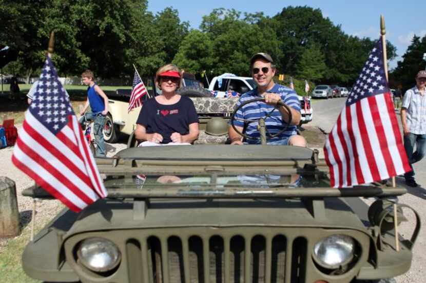 
Marilyn Winfree, 66, and her husband Chuck Winfree, 64, sit in a 1945 Ford GPW Jeep, which...