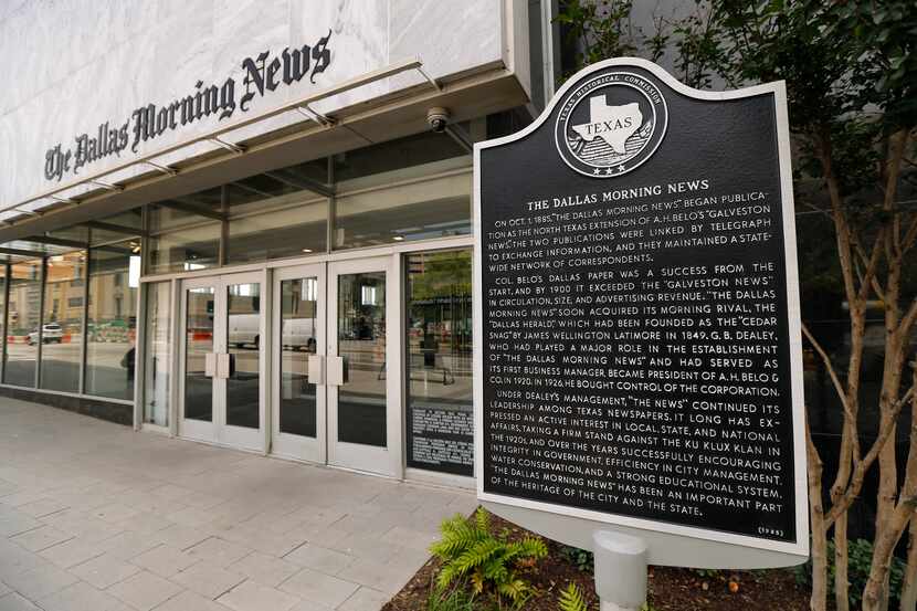 A historical marker near the entrance to The Dallas Morning News headquarters on Commerce...