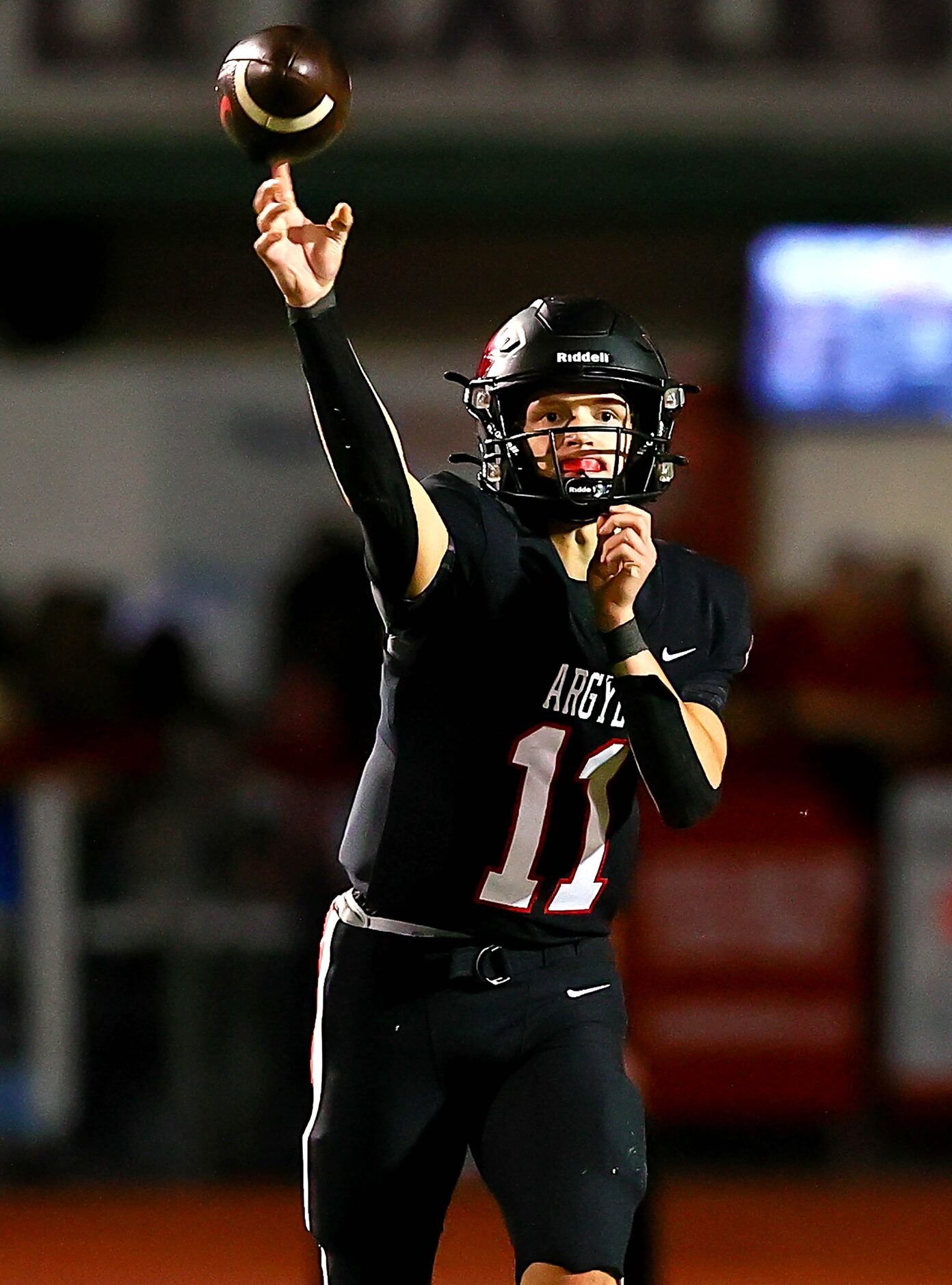 Argyle quarterback Maguire Gasperson makes a pass downfield against Frisco Emerson during...