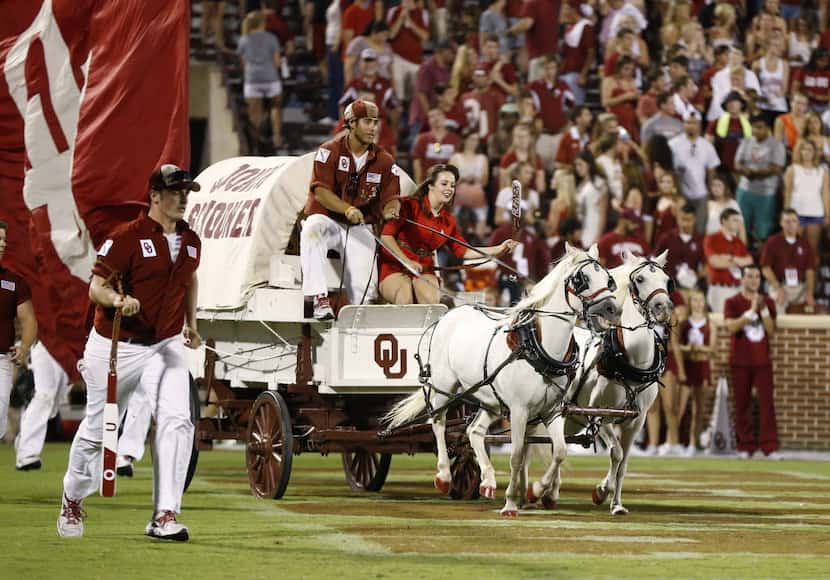 The Oklahoma Sooner Schooner is driven out onto the field following an Oklahoma touchdown...