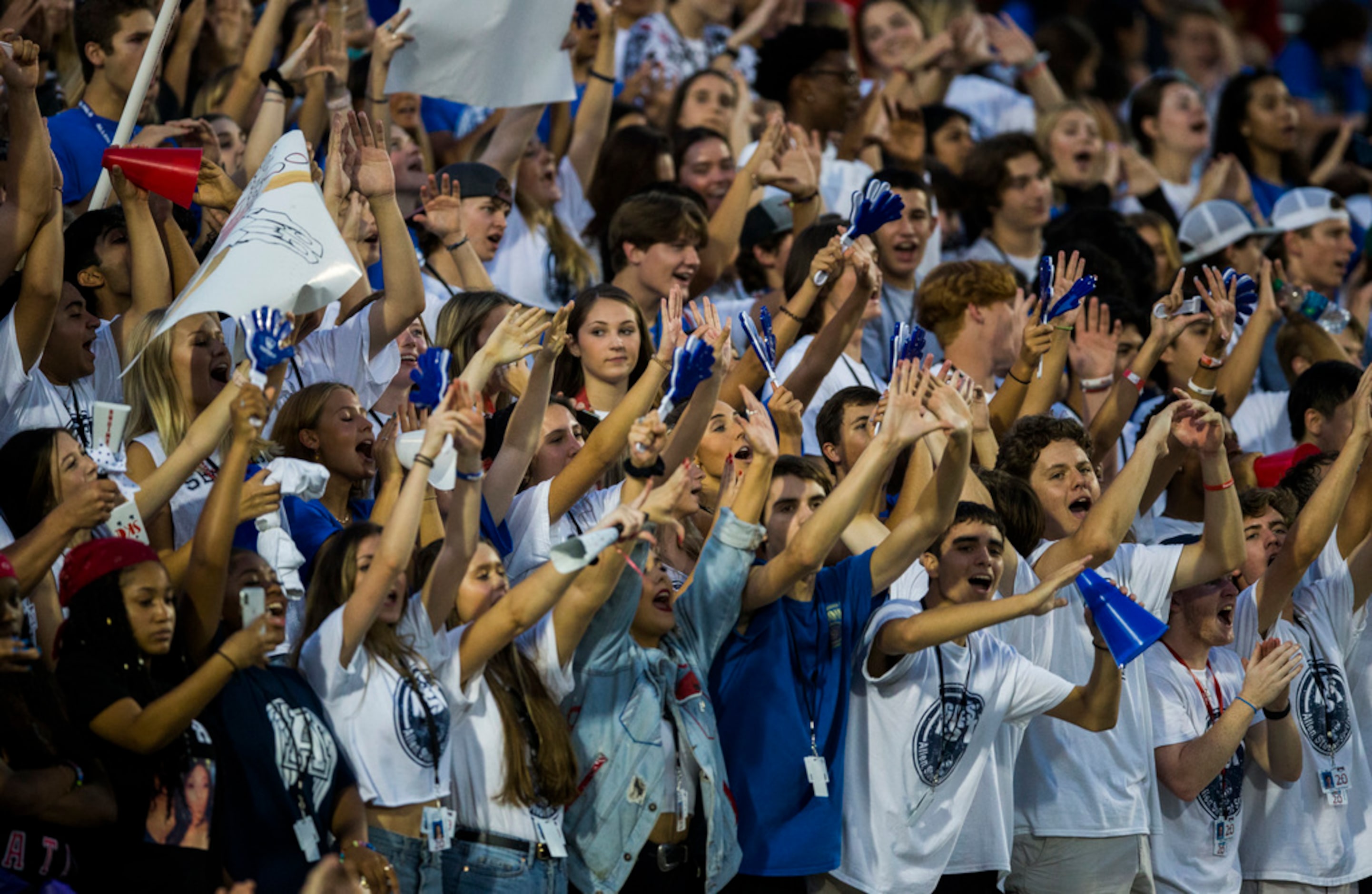 Allen fans cheer during the second quarter of a high school football game between Allen and...