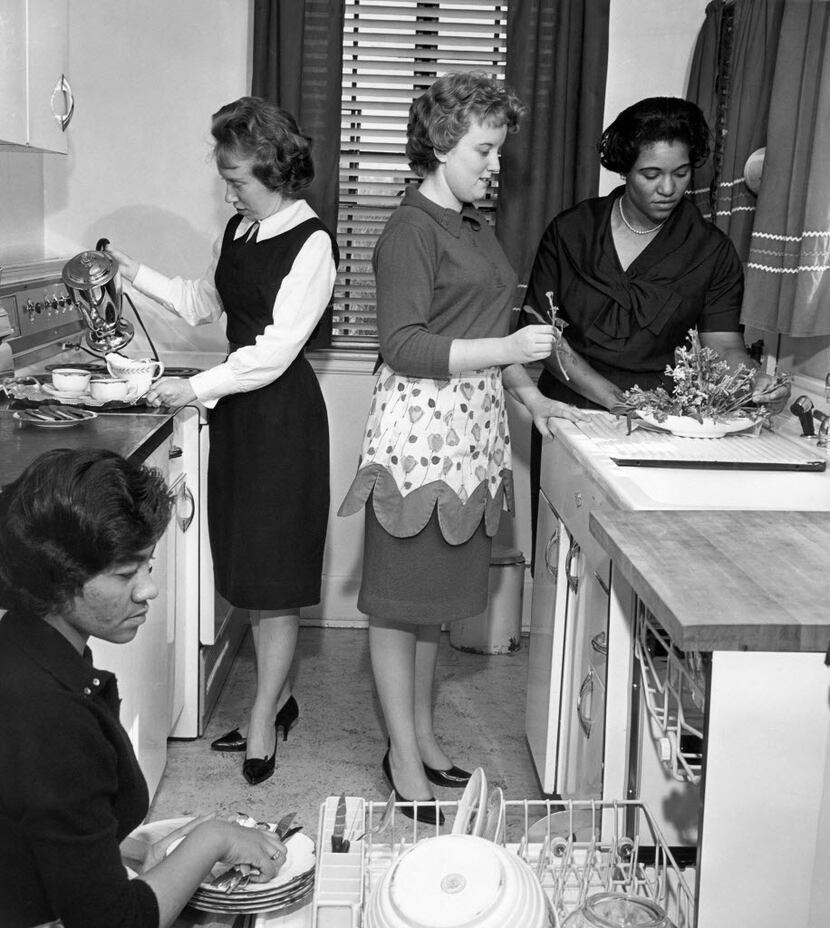 In March 1963, students participate in a home economics class at West Virginia State College...