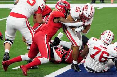 Katy running back Jalen Davis (28) scores on a 3-yard touchdown run past Cedar Hill middle...