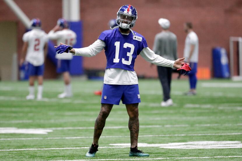 New York Giants wide receiver Odell Beckham reacts after a drill during NFL football...