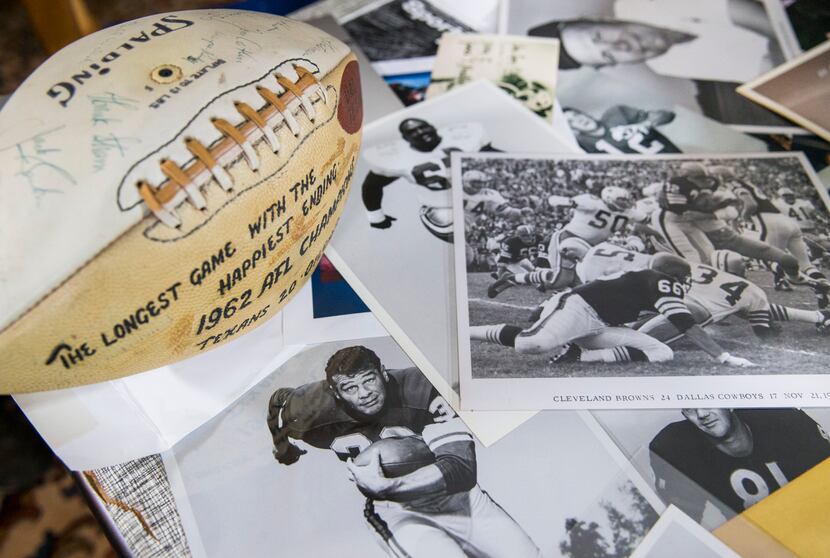 A game ball from the 1962 AFL Championship game and photos taken by sports photographer Brad...