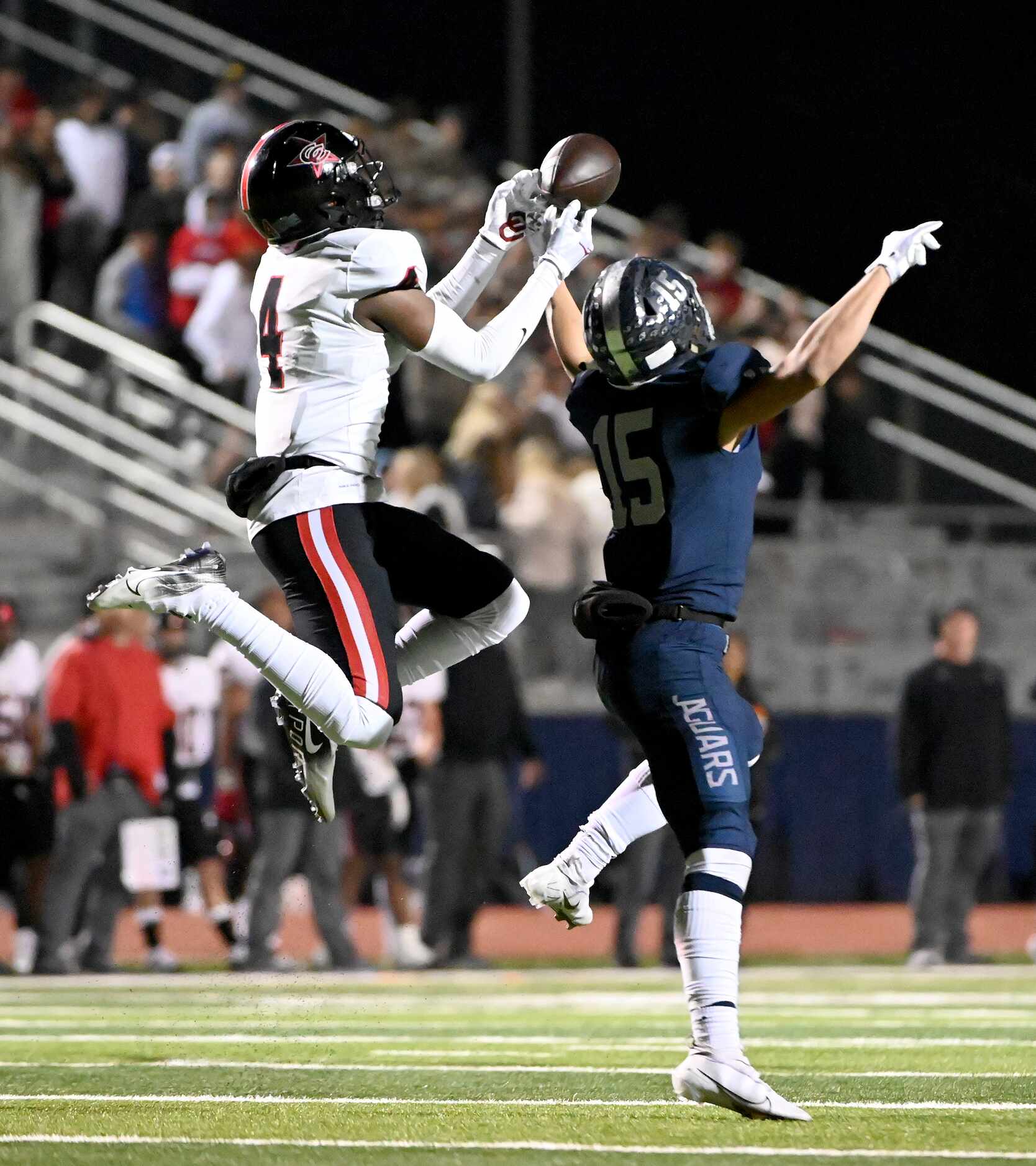 Coppell's Braxton Myers (4) breaks up a pass intended for Flower Mound's Walker Mulkey (15)...
