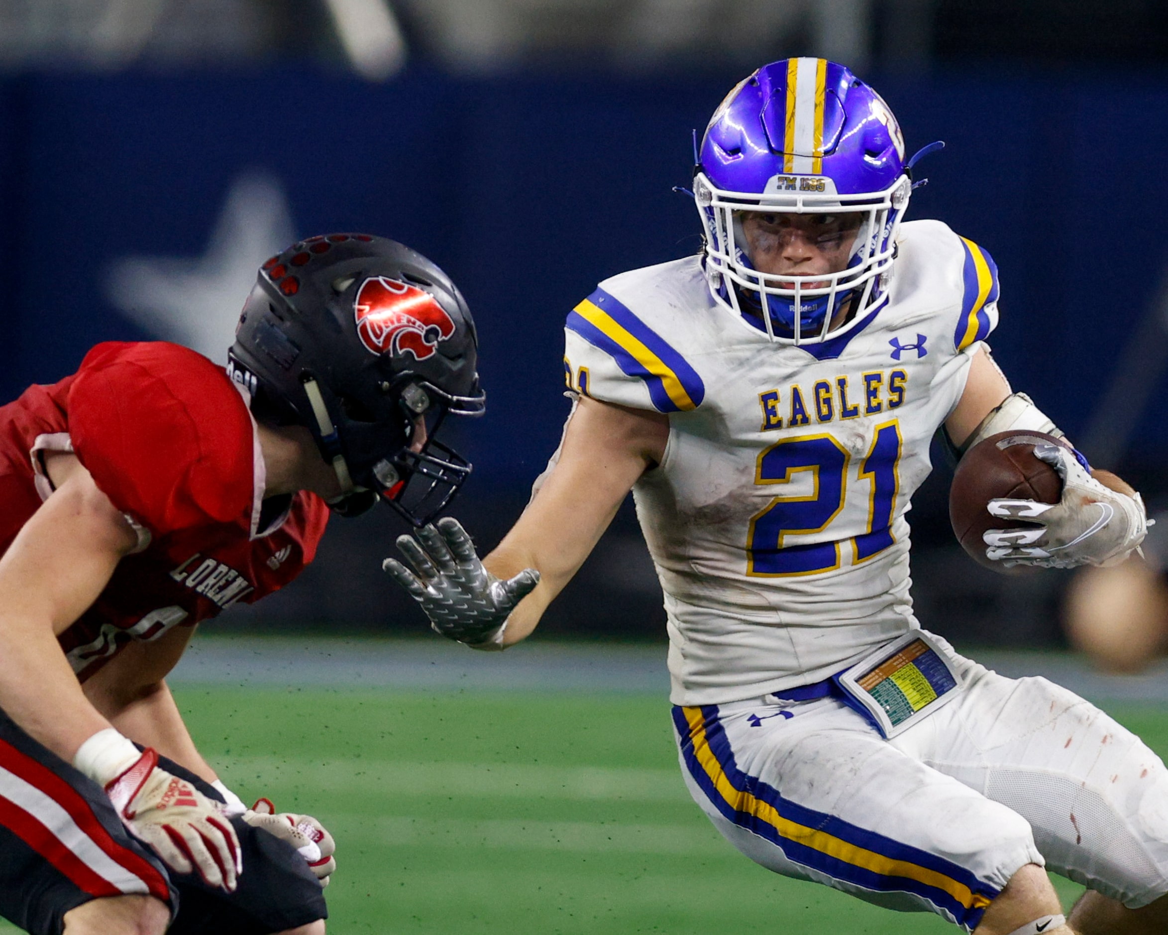 Brock running back Kutter Wilson (21) looks to stiff arm Lorena defensive back Colton Dale...