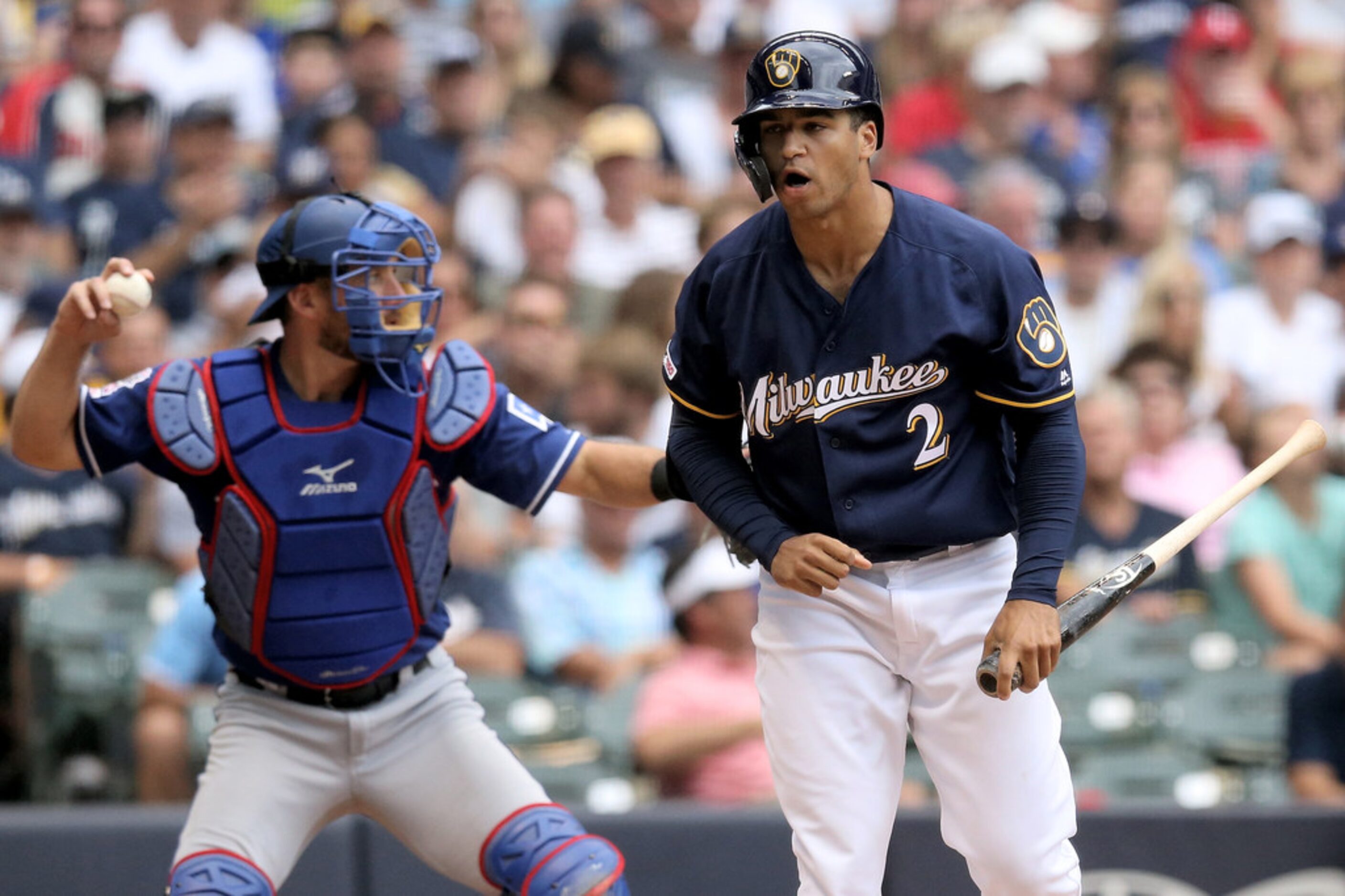 MILWAUKEE, WISCONSIN - AUGUST 11:  Trent Grisham #2 of the Milwaukee Brewers reacts after...