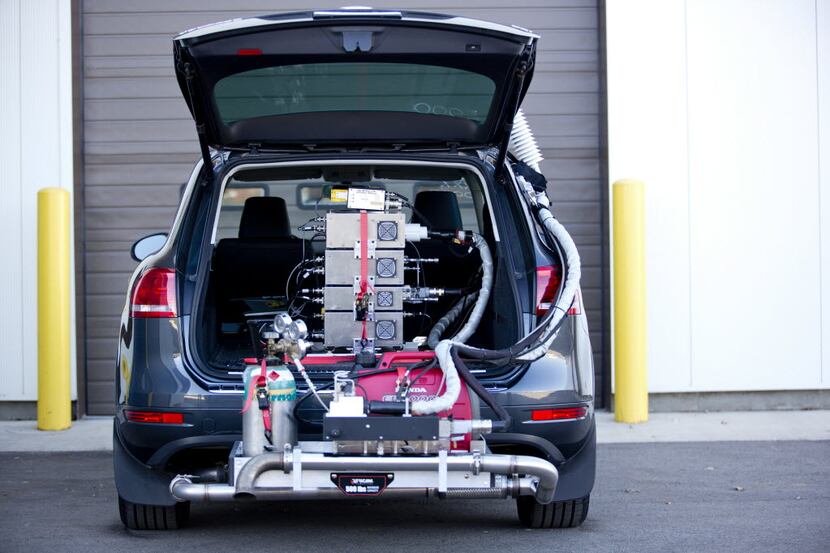 A 2014 Volkswagen Touareg TDI, a diesel model, equipped with a portable emissions testing...