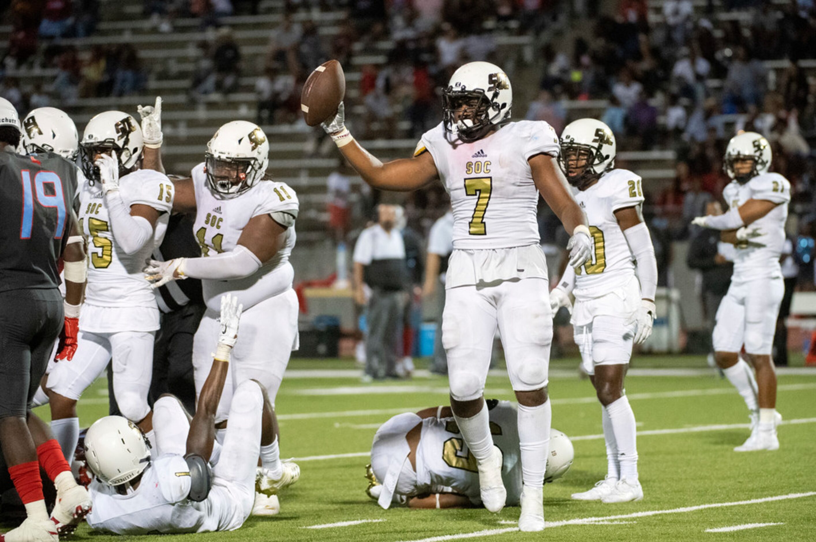 South Oak Cliff senior wide receiver DeMarco Moon (4) races towards the end zone en route to...