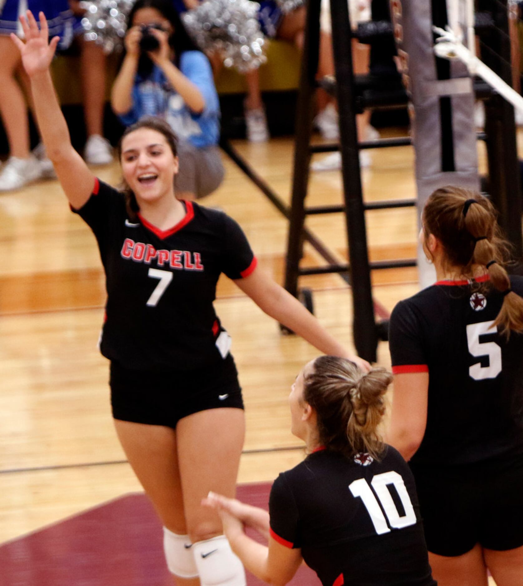 Coppell outside hitter Skye LaMendola (7) reacts after blocking a shot by Trophy Club Byron...