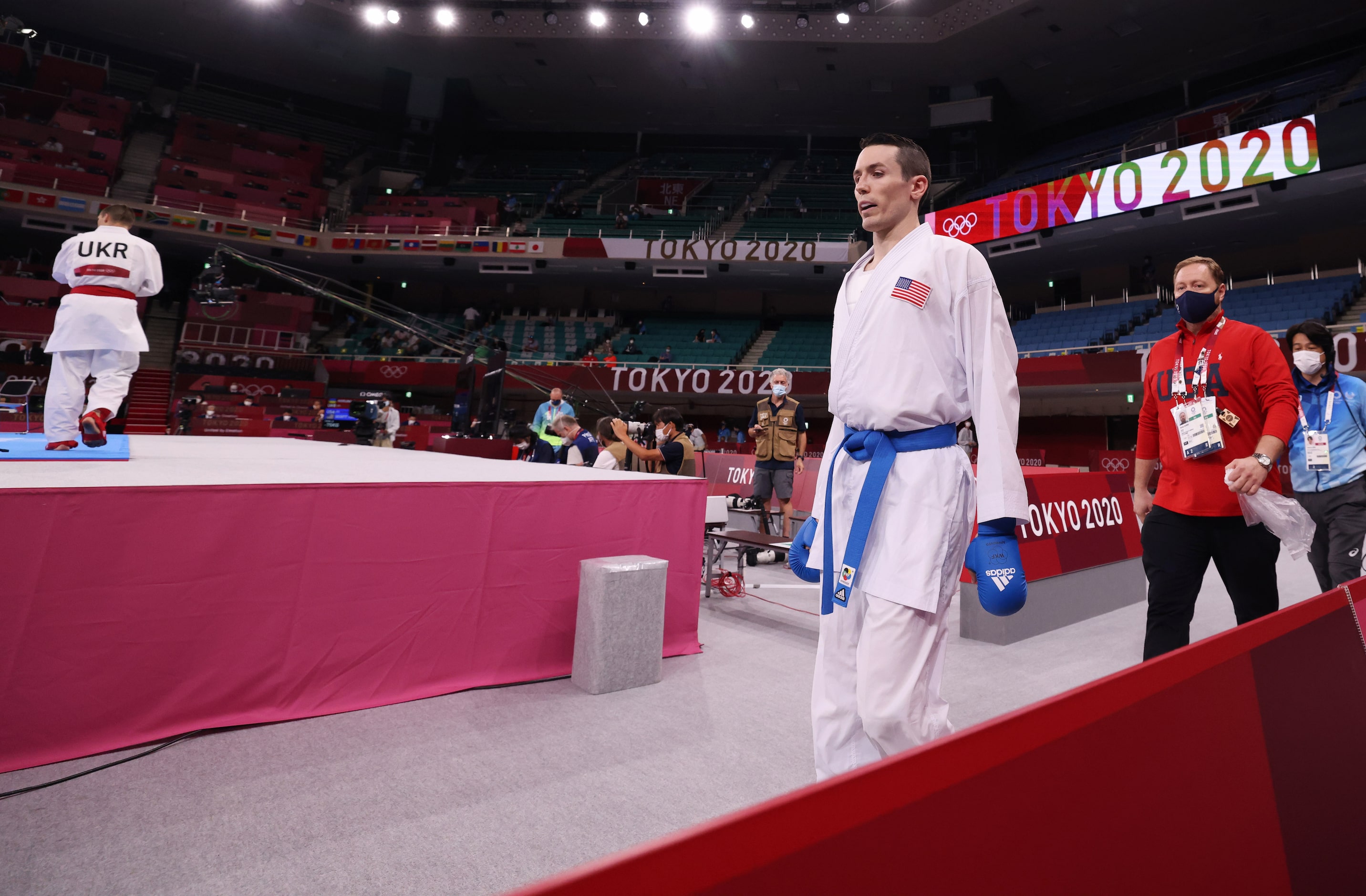 USA’s Tom Scott prepares to enter the stage to fight against Ukraine’s Stanislav Horuna...