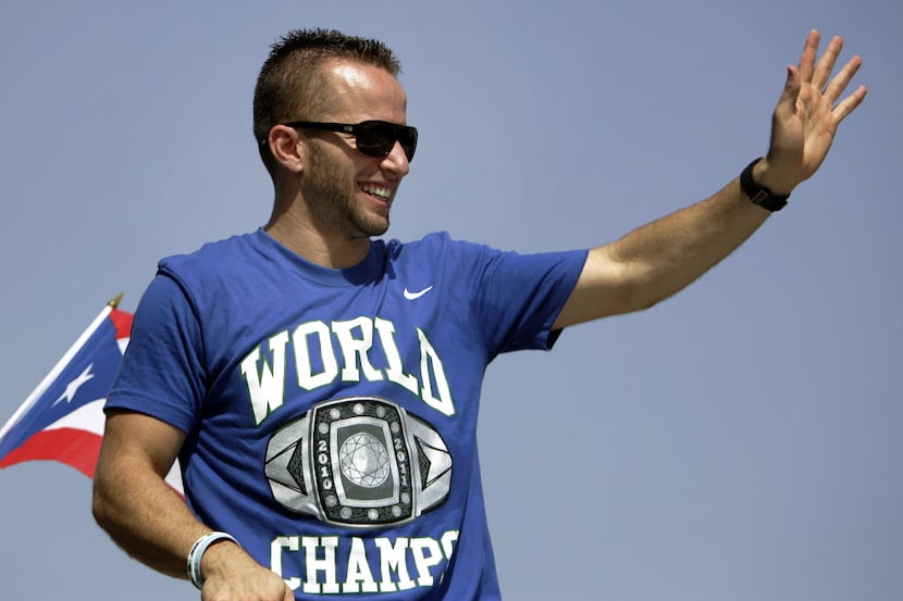 NBA Dallas Mavericks basketball player Jose Juan Barea, of Puerto Rico, waves to fans during...