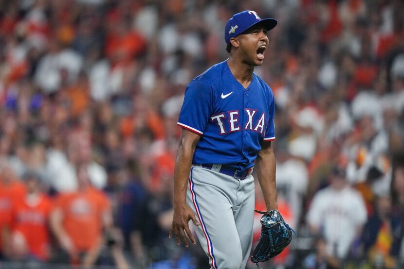 Texas Rangers relief pitcher Jose Leclerc (25) screams after getting the third out while the...