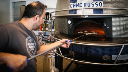 At Cane Rosso in Frisco, the pizza oven is shaped like a Dallas Cowboys helmet.