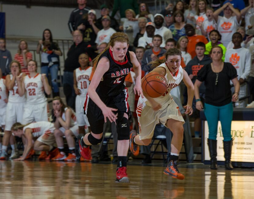 COMMERCE, TX - FEBRUARY 22: Vivian Gray (12) of the Argyle Lady Eagles knocks the ball loose...