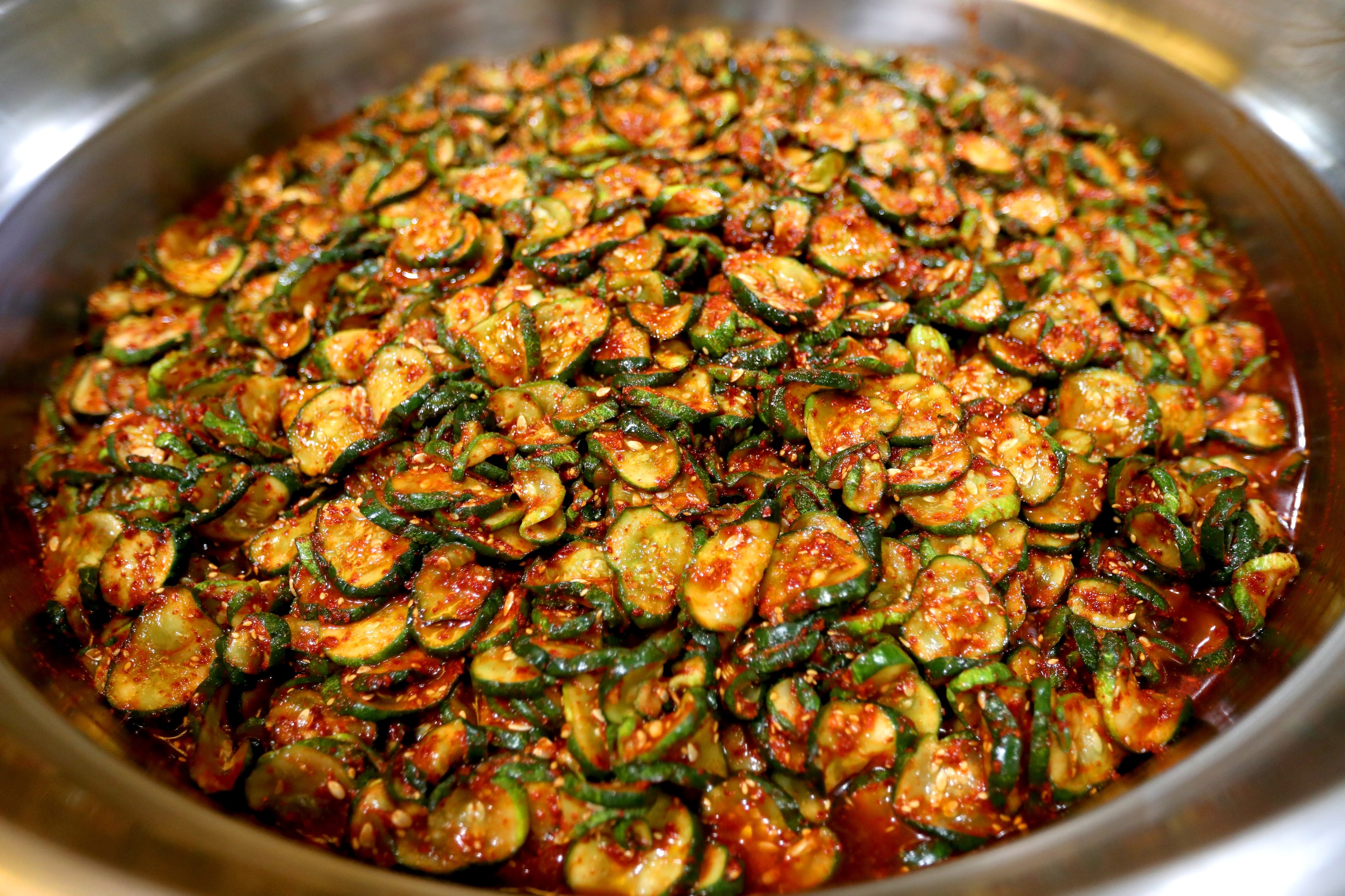 Cucumber salad is made at H Mart in Carrollton, Texas. 