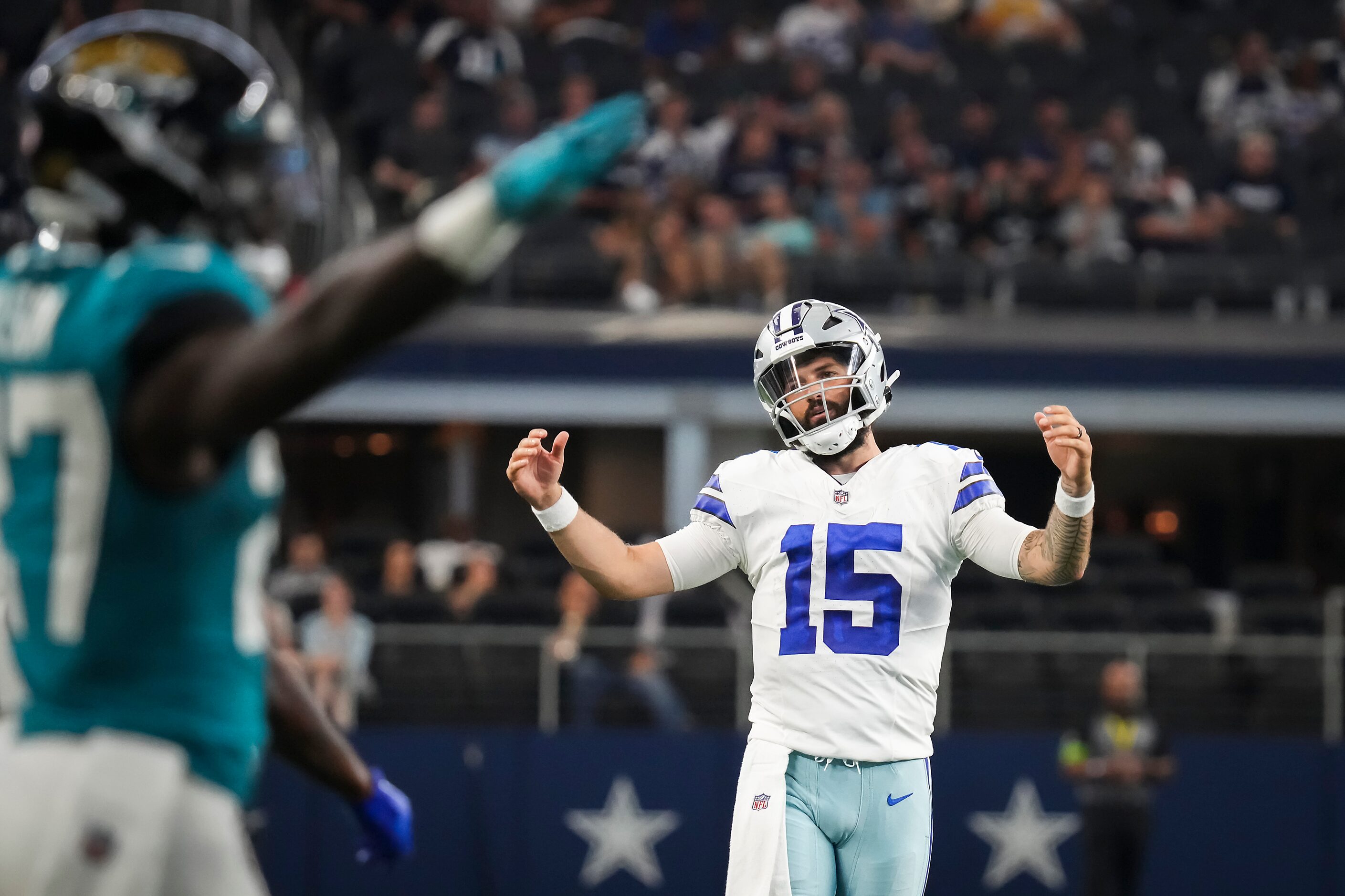 Dallas Cowboys quarterback Will Grier (15) reacts after throwing an incomplete pass during...