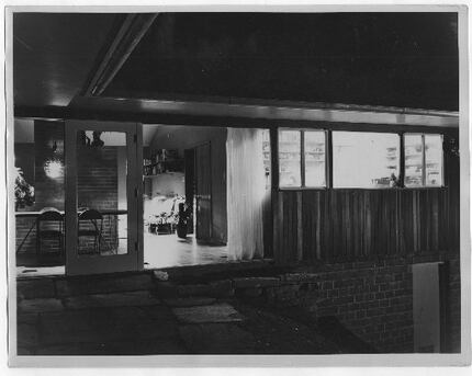 The house was designed to be opened up to the outdoors, as shown in this 1950s photograph....
